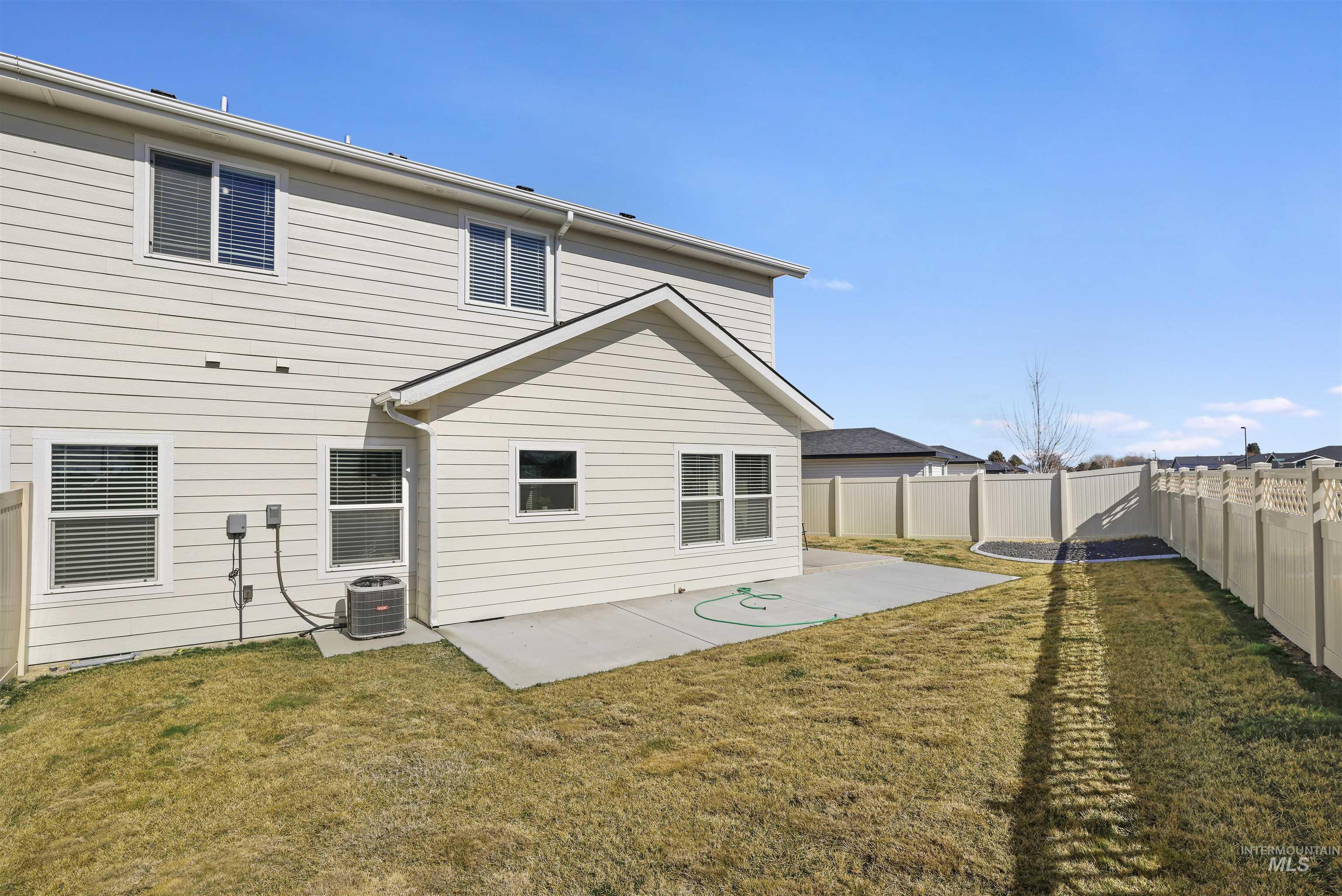 893-899 Shadowleaf Avenue Twin Falls, ID 83301 - Photo 37 of 50 Back of property with a patio area and a fenced backyard