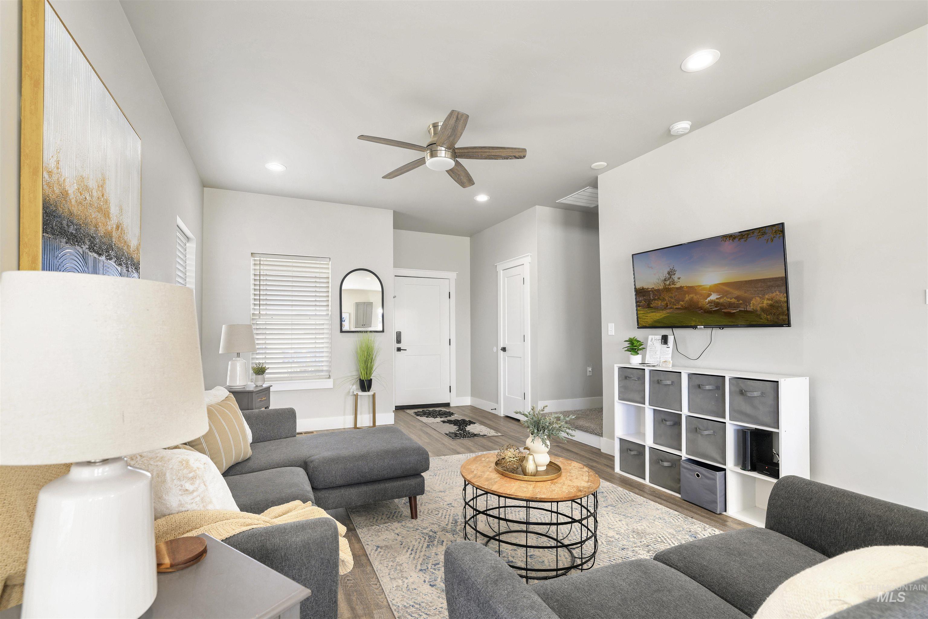 893-899 Shadowleaf Avenue Twin Falls, ID 83301 - Photo 4 of 50 Living room featuring light wood-style flooring, ceiling fan, and recessed lighting
