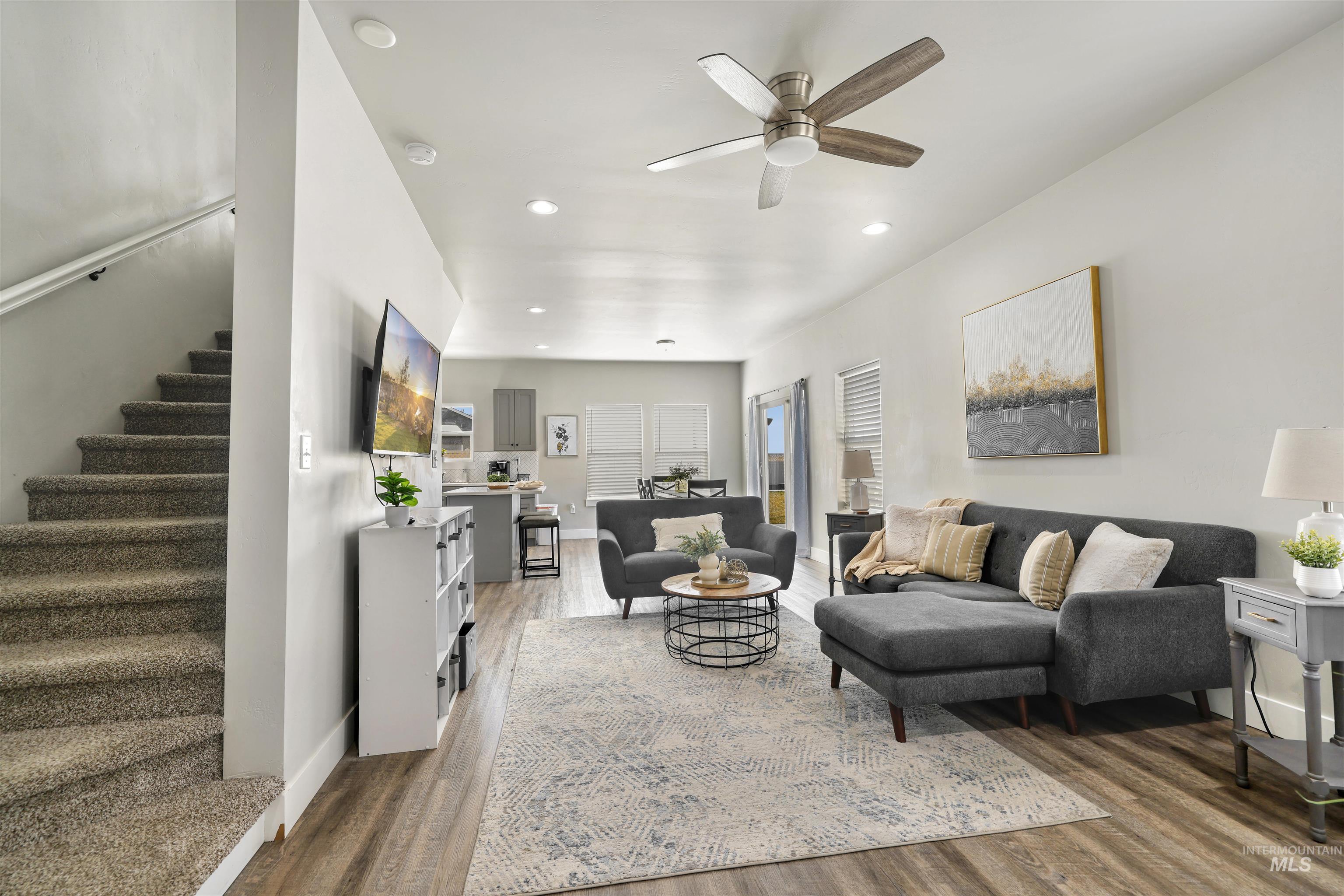 893-899 Shadowleaf Avenue Twin Falls, ID 83301 - Photo 41 of 50 Living area featuring recessed lighting, ceiling fan, and wood finished floors
