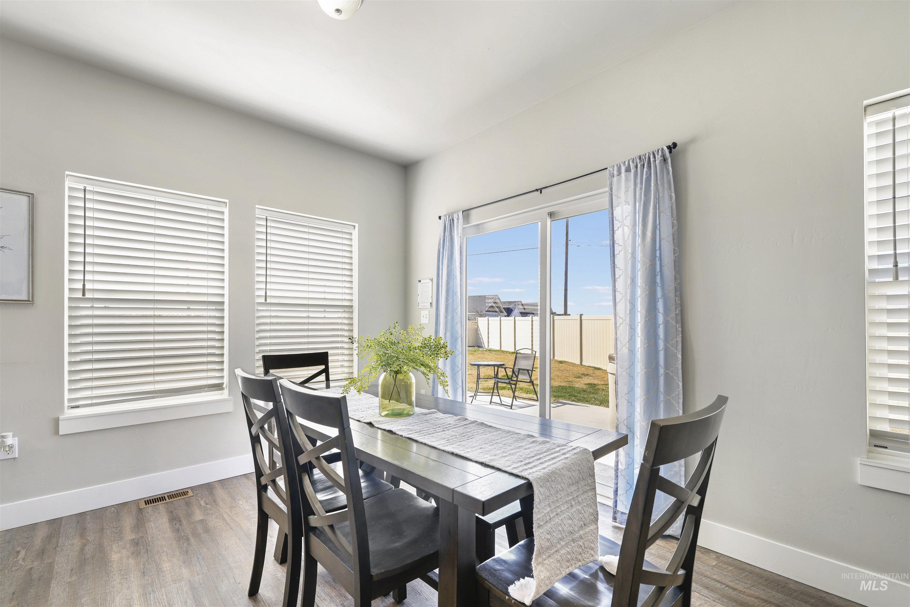 893-899 Shadowleaf Avenue Twin Falls, ID 83301 - Photo 5 of 50 Dining room with wood finished floors and baseboards