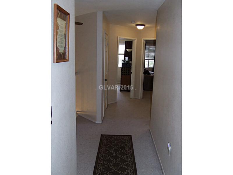 2168 Running River Road Henderson, NV 89074 - Photo 23 of 35 Other. Spacious hallway overlooks living area to the left...