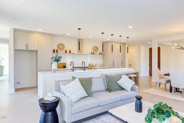 a spacious bathroom with a double vanity sink mirror and double