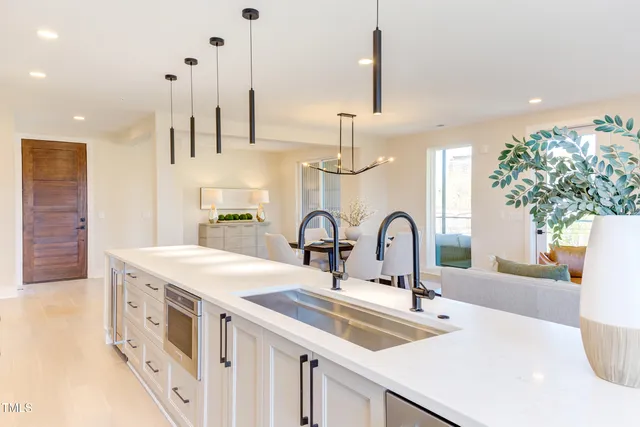 a bathroom with a sink vanity and a mirror