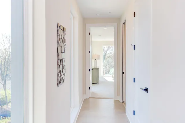 a view of entryway with wooden floor and stairs
