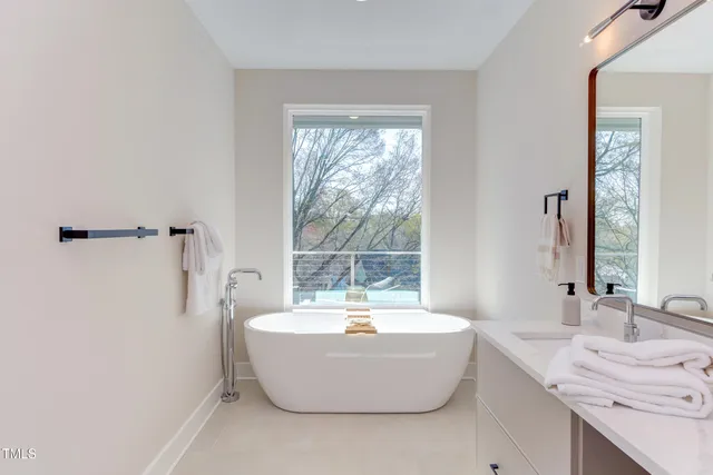 a close up of a bathtub in a bathroom