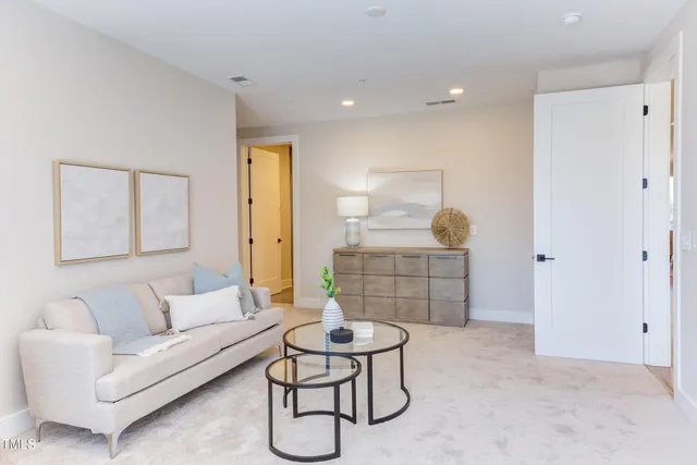 a view of balcony with wooden floor and outdoor seating