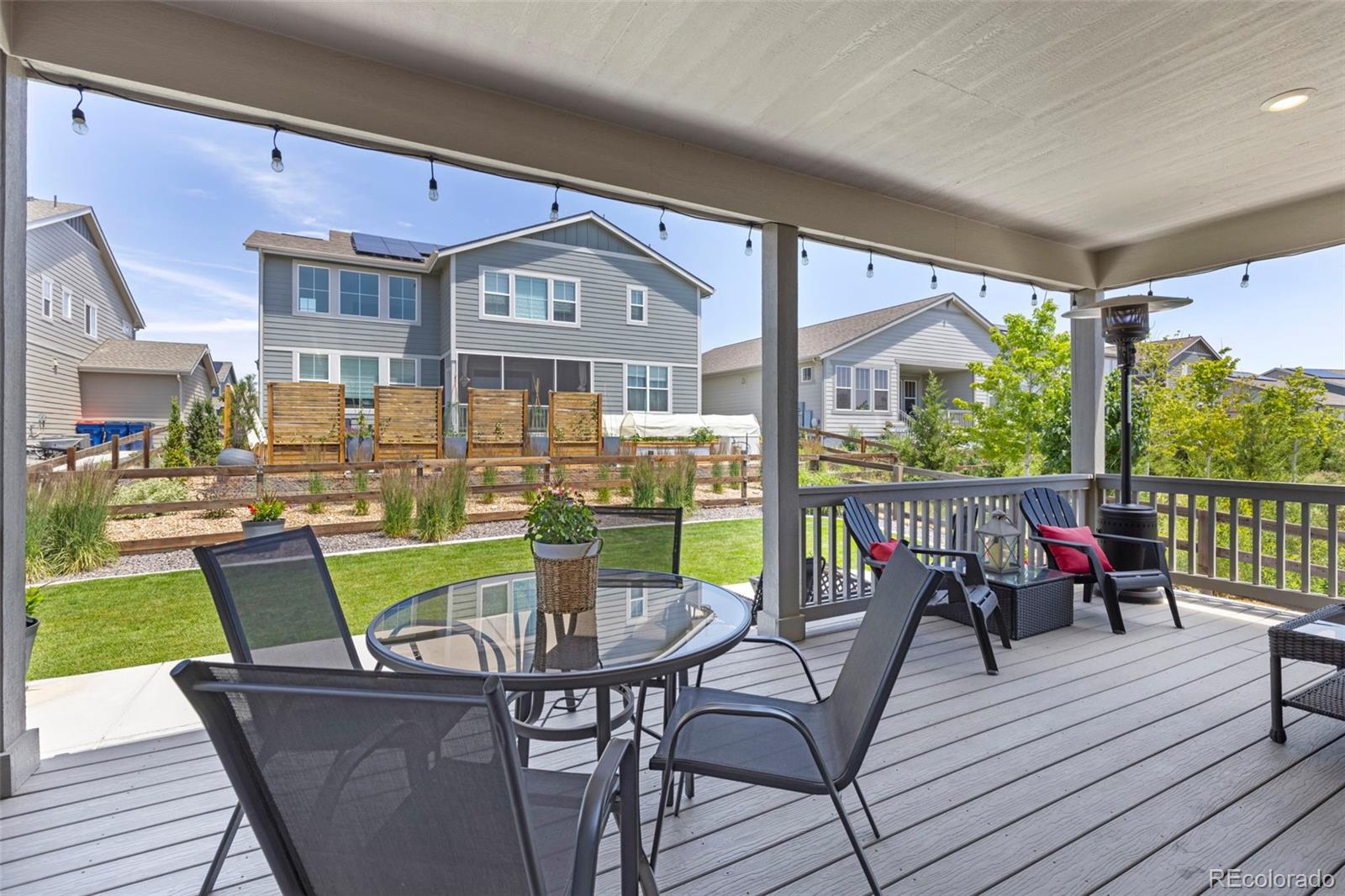 5067 Preserve Place Firestone, CO 80504 - Photo 12 of 50 a view of a dining room with furniture window and wooden floor