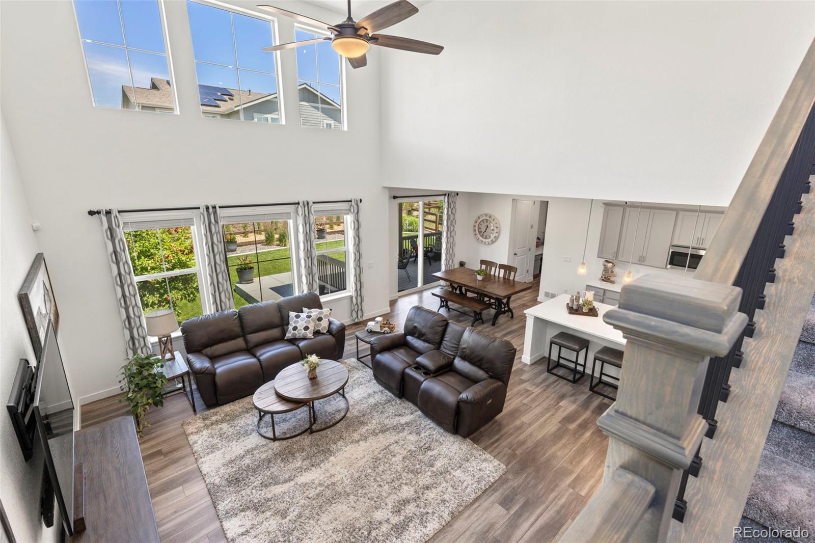5067 Preserve Place Firestone, CO 80504 - Photo 20 of 50 a living room with furniture and a large window