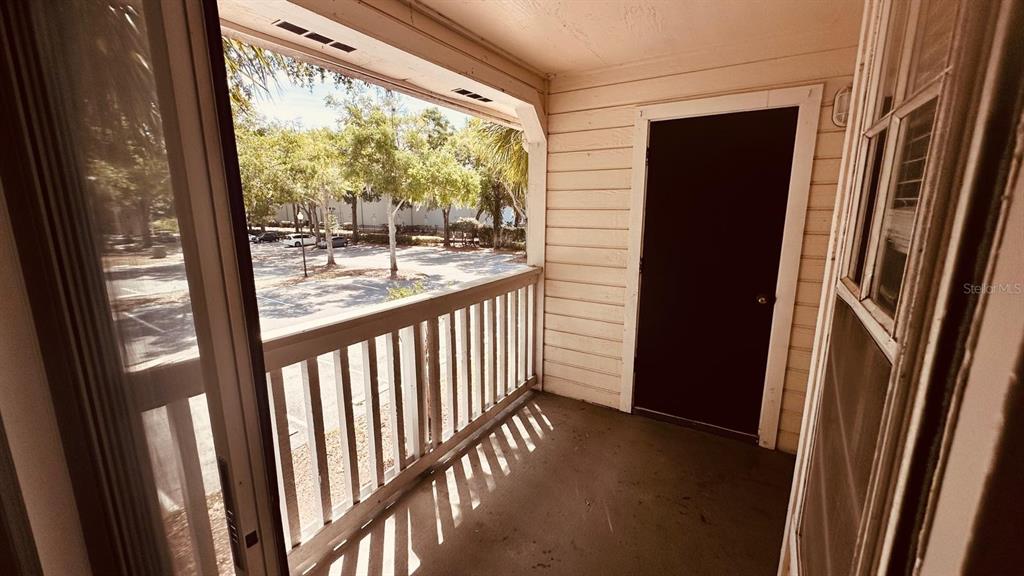 1087 South Hiawassee Road, Unit 422 Orlando, FL 32835 - Photo 15 of 17 a view of a porch