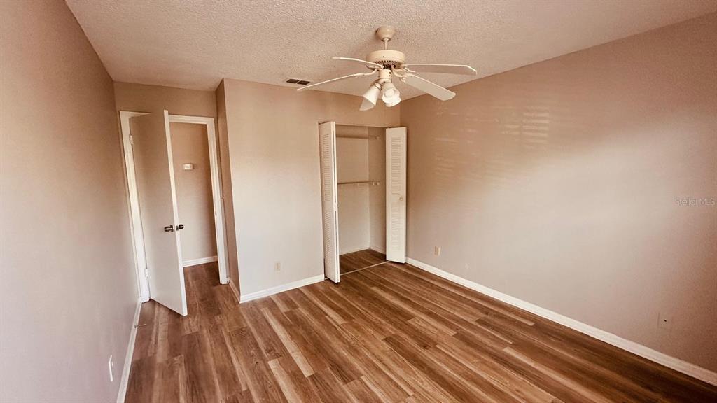 1087 South Hiawassee Road, Unit 422 Orlando, FL 32835 - Photo 17 of 17 a view of a room with wooden floor