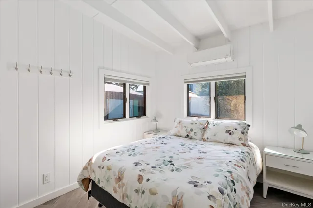 a view of a livingroom with a flat screen tv