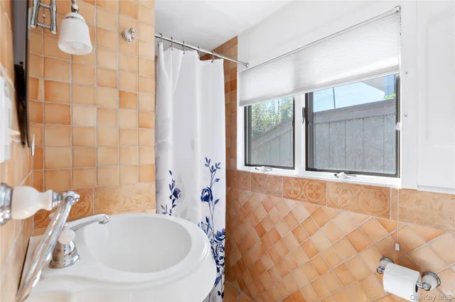 a living room with furniture and flat screen tv