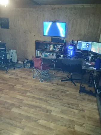 a room with furniture and a lamp