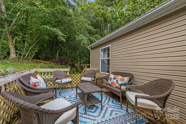 a outdoor sitting area with furniture and garden
