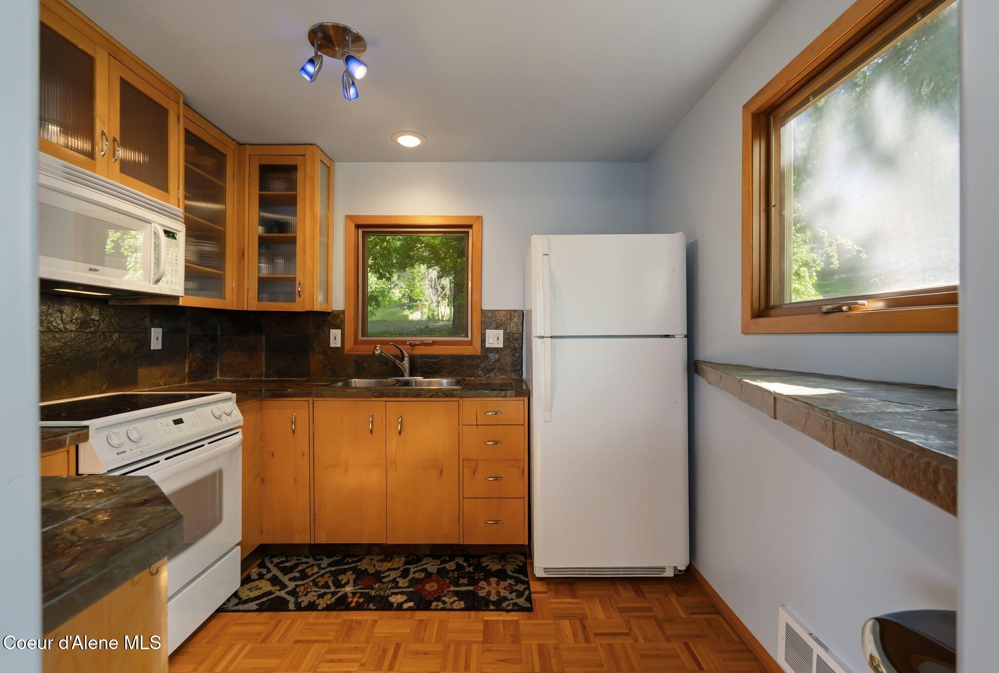 5495 Bottle Bay Road Sagle, ID 83860 - Photo 14 of 44 .