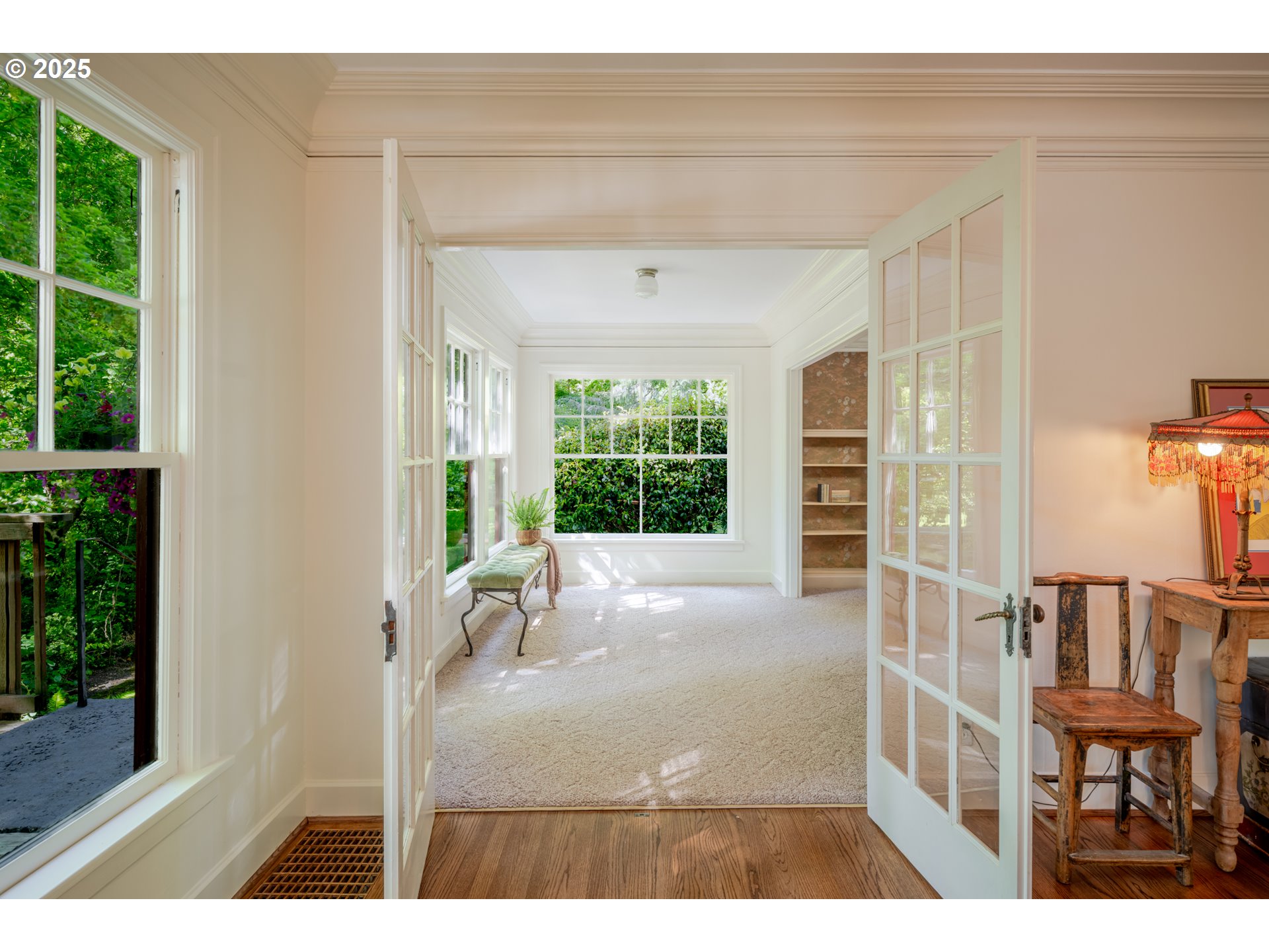 92216 Whiskey Road Warrenton, OR 97146 - Photo 11 of 48 a picture of a floor to ceiling window and dining room