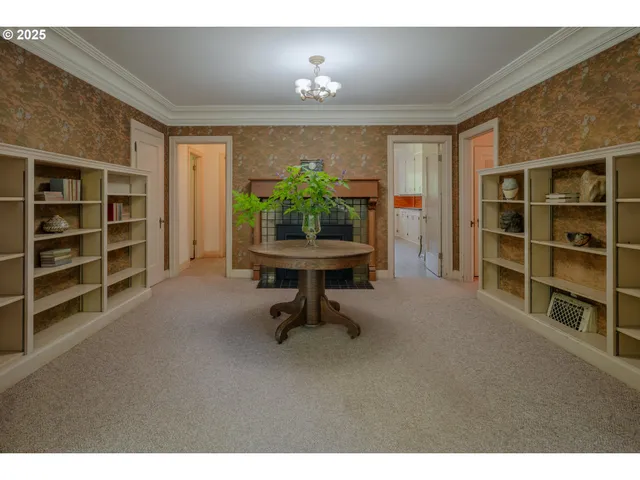 a view of a livingroom with furniture and a window