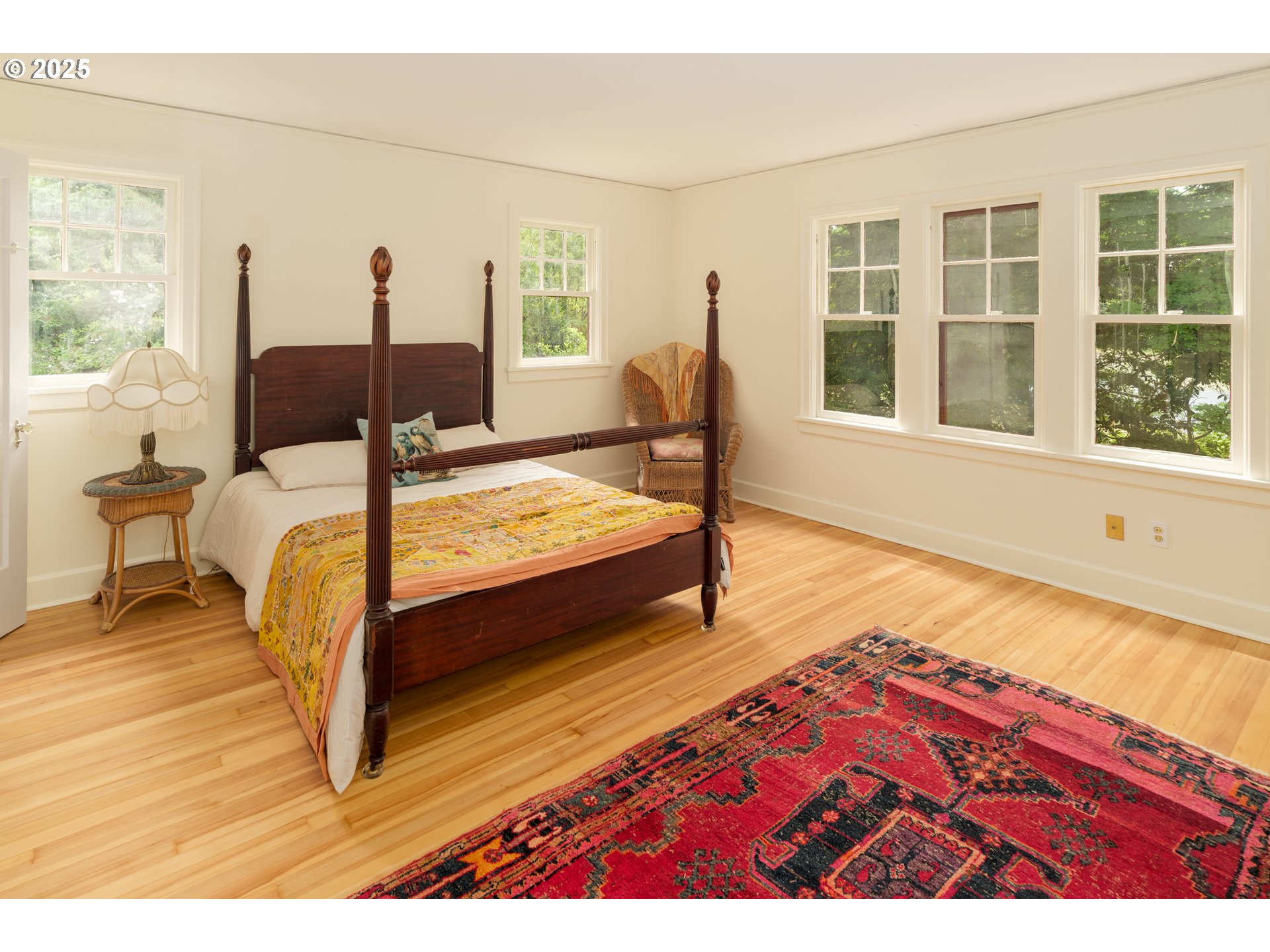 92216 Whiskey Road Warrenton, OR 97146 - Photo 34 of 48 a bedroom with two beds and a large window