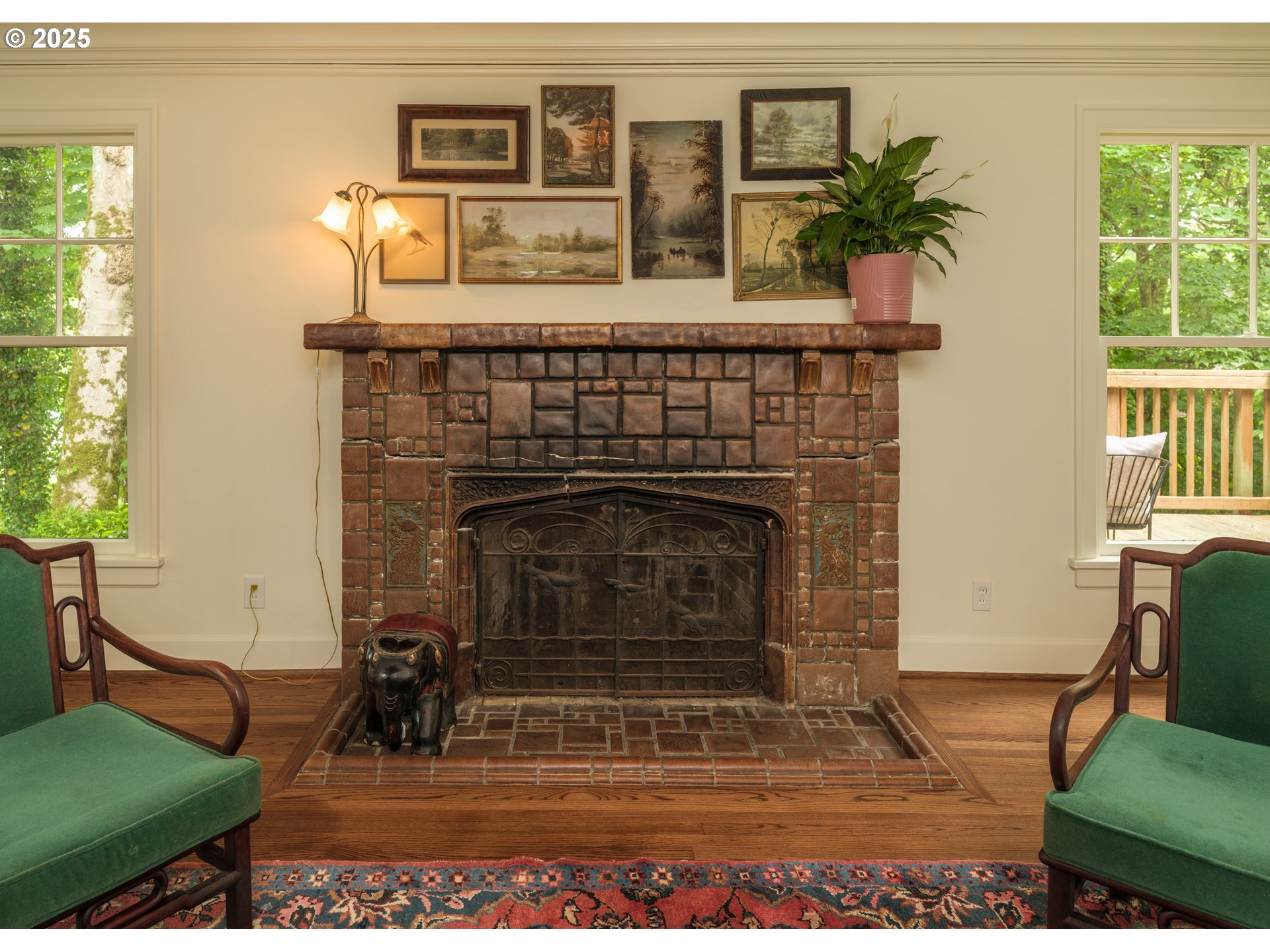 92216 Whiskey Road Warrenton, OR 97146 - Photo 7 of 48 a living room with furniture and a fireplace