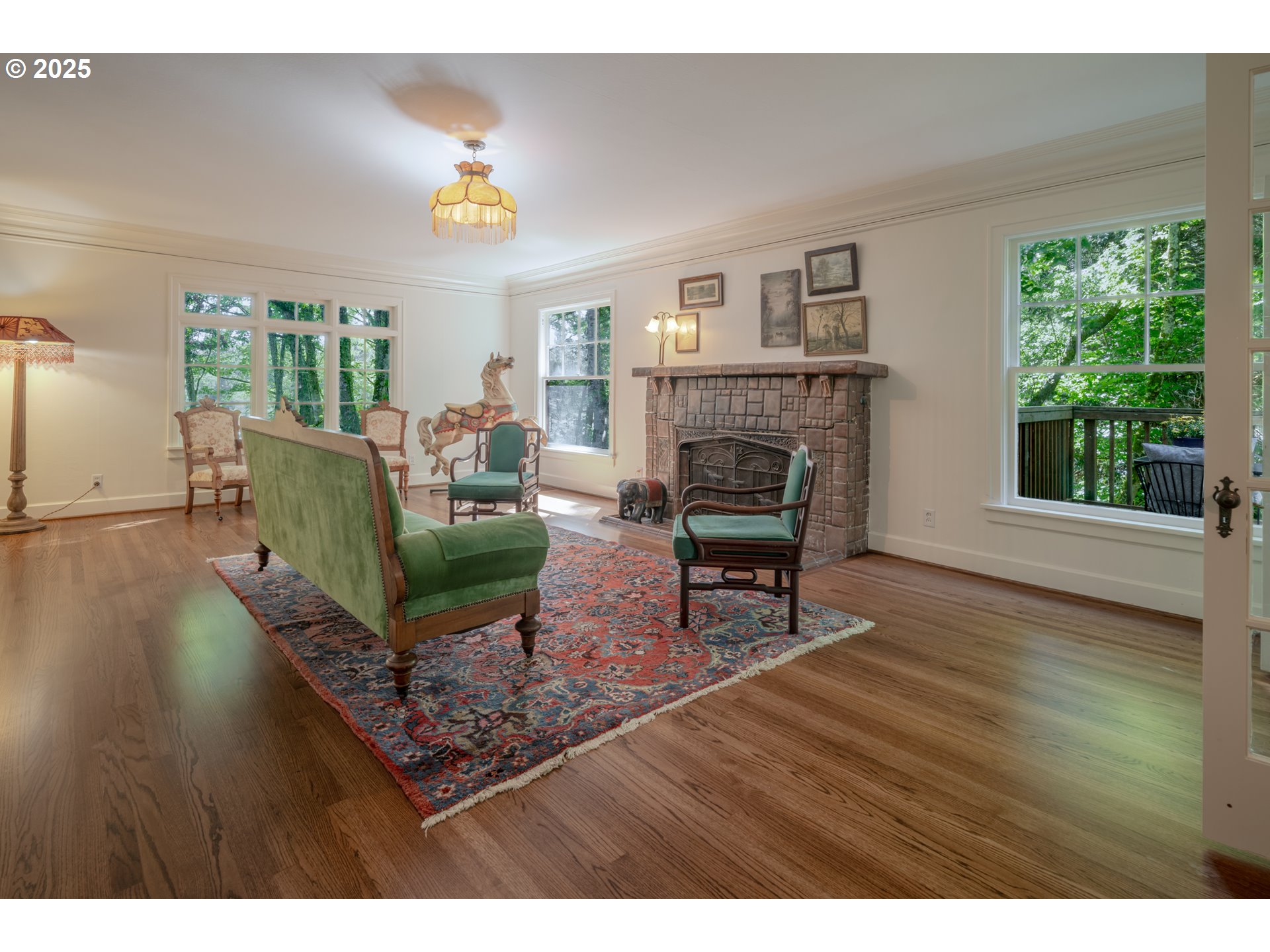 92216 Whiskey Road Warrenton, OR 97146 - Photo 9 of 48 a living room with furniture and a fireplace