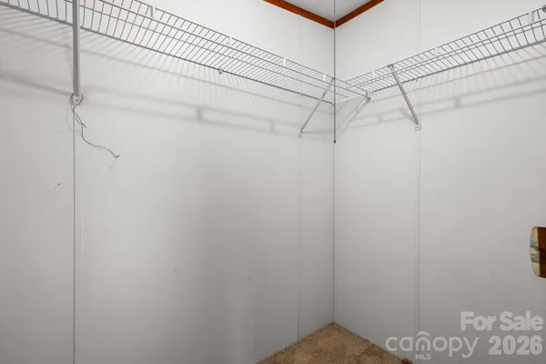 a view of a room with racks on the wall