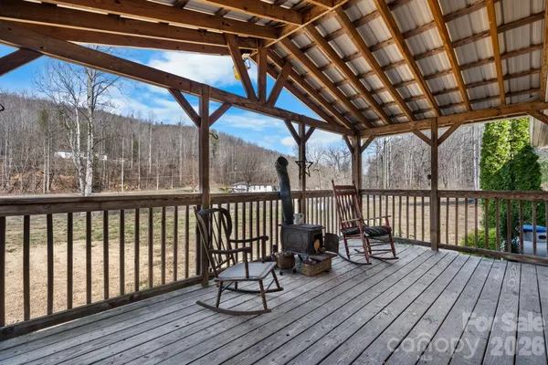 a view of balcony with wooden floor