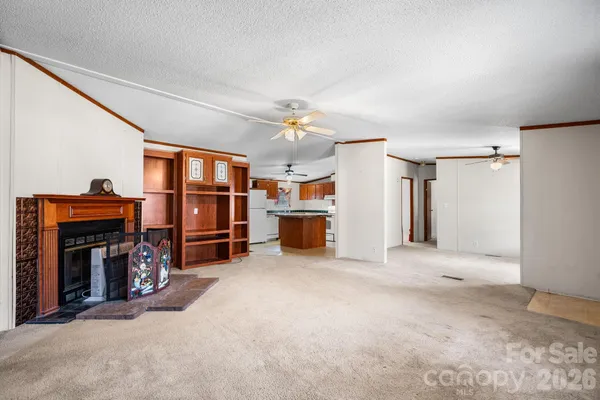 a view of a livingroom with a fireplace