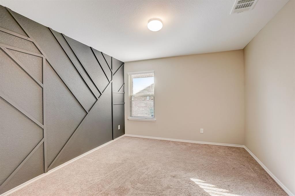 2113 Rubin Road Fate, TX 75189 - Photo 22 of 37 Empty room with light carpet and baseboards