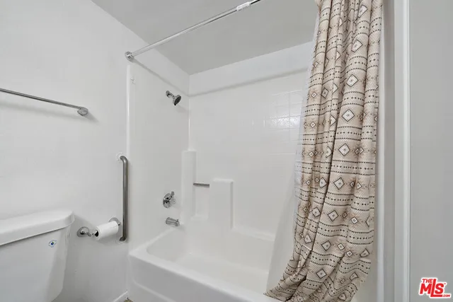 a view of a hallway with an entryway