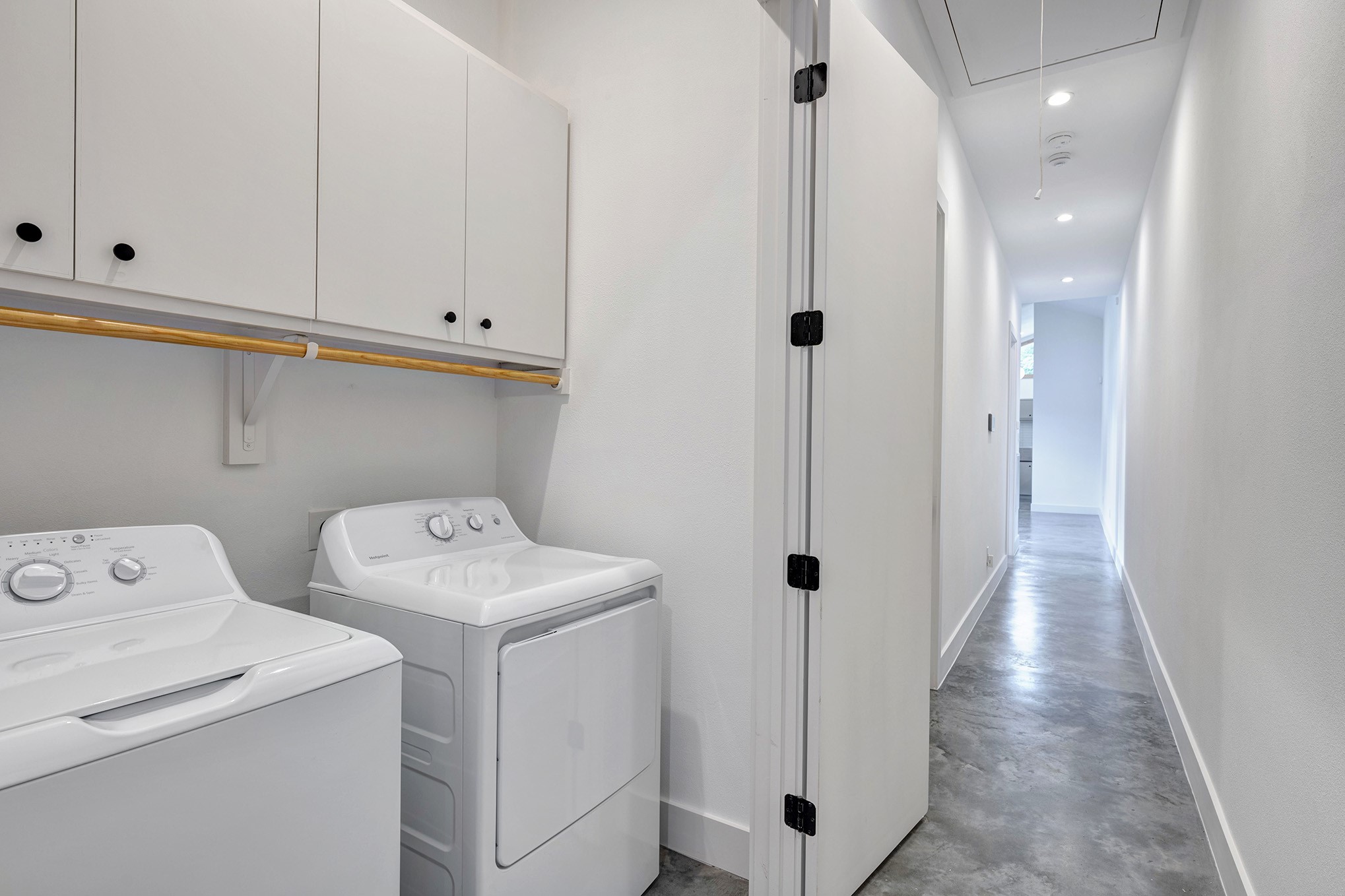 907 Kern Street, Unit B Houston, TX 77009 - Photo 12 of 18 a view of utility room with washer and dryer