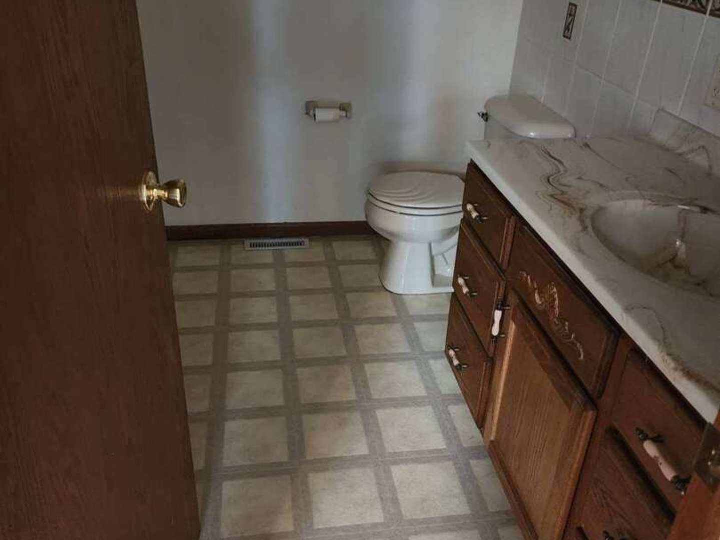 2871 East 777th Road Utica, IL 61373 - Photo 8 of 18 a bathroom with a sink and a toilet