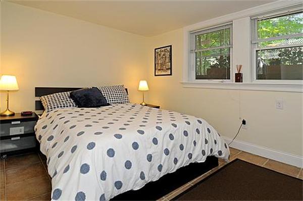 136-138 Middlesex Road, Unit B Chestnut Hill, MA 02467 - Photo 8 of 13 a bedroom with a bed and wooden floor