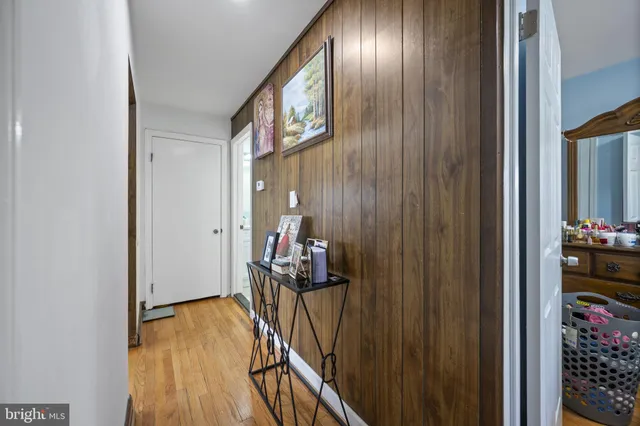 a bedroom with bed and a window