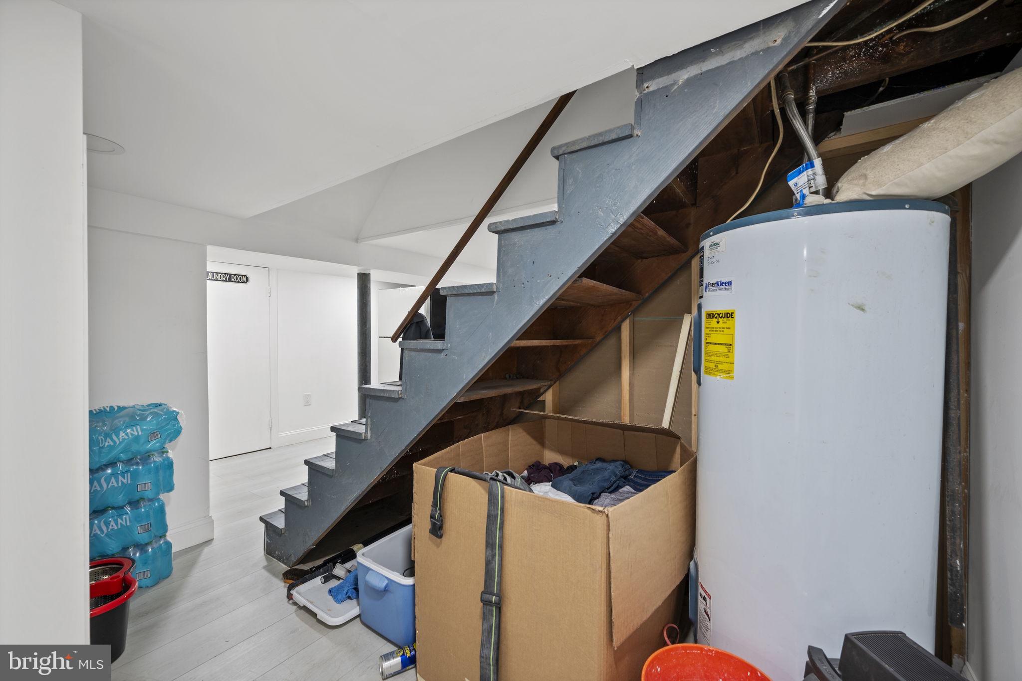 7715 Old Battle Grove Road Dundalk, MD 21222 - Photo 22 of 61 a view of hallway with stairs
