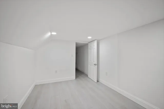 a bathroom with a shower and toilet