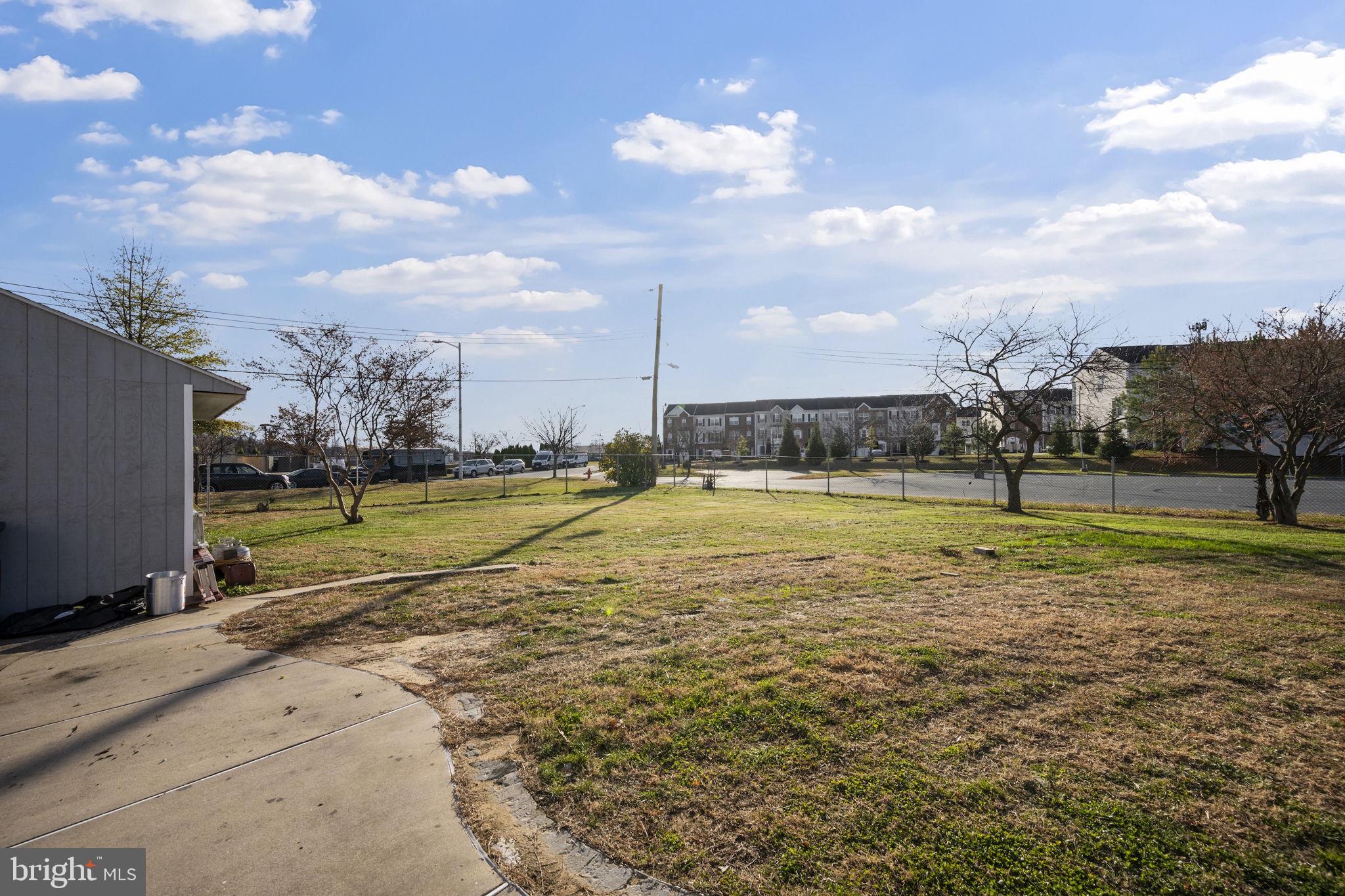 7715 Old Battle Grove Road Dundalk, MD 21222 - Photo 43 of 61 a view of a swimming pool with a yard