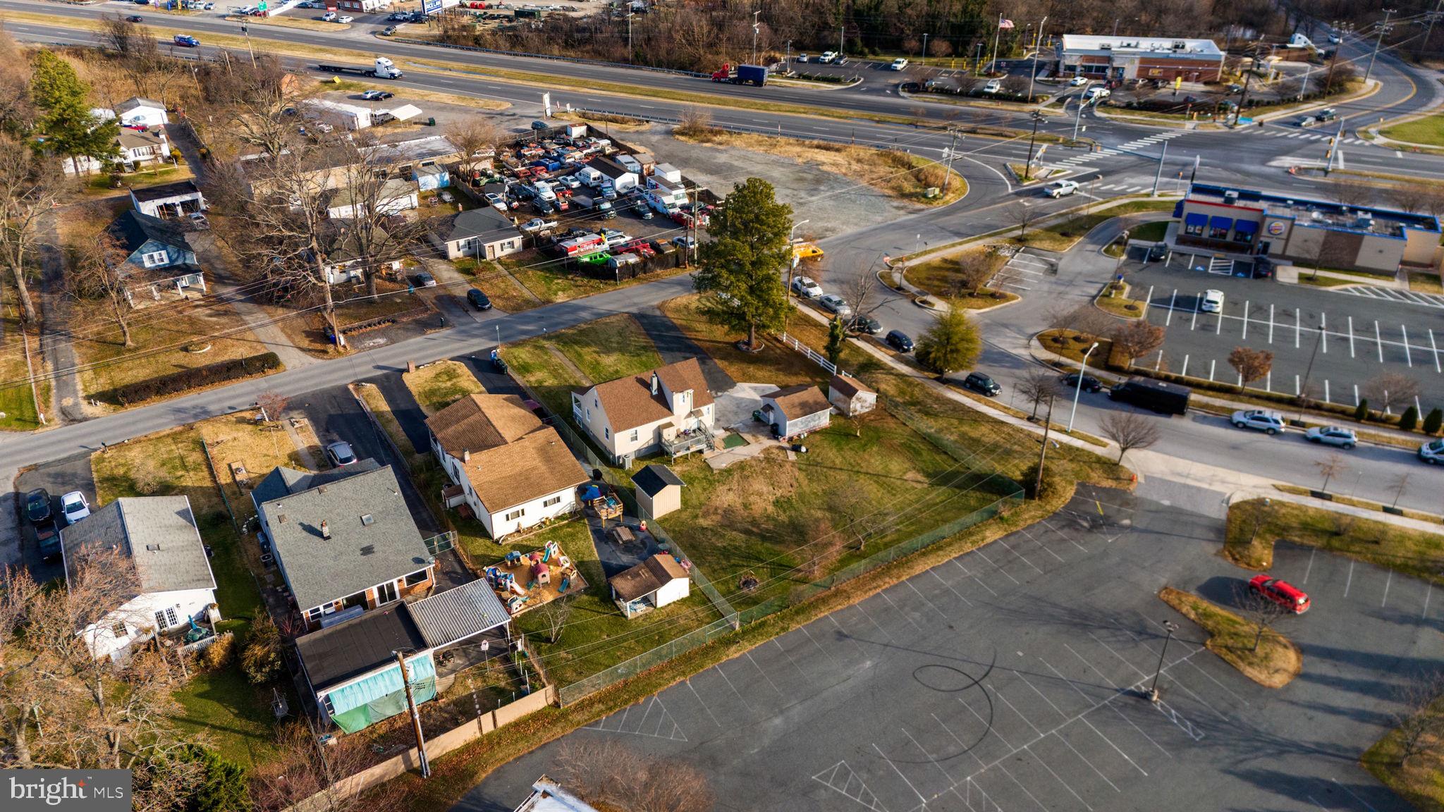 7715 Old Battle Grove Road Dundalk, MD 21222 - Photo 48 of 61 an aerial view of a swimming pool patio and outdoor seating