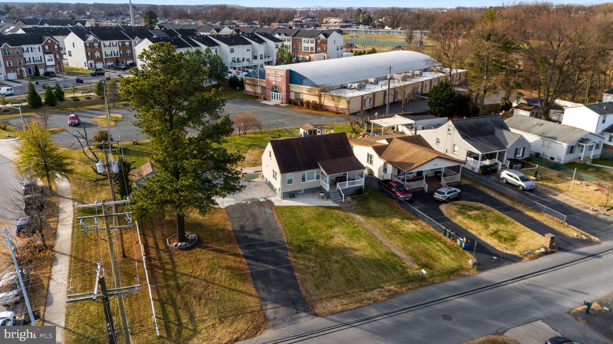 7715 Old Battle Grove Road Dundalk, MD 21222 - Photo 50 of 61 an aerial view of residential houses with outdoor space