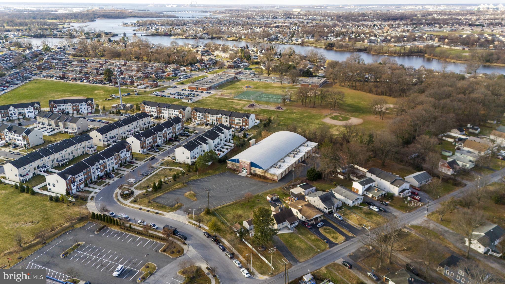 7715 Old Battle Grove Road Dundalk, MD 21222 - Photo 52 of 61 an aerial view of residential houses with outdoor space