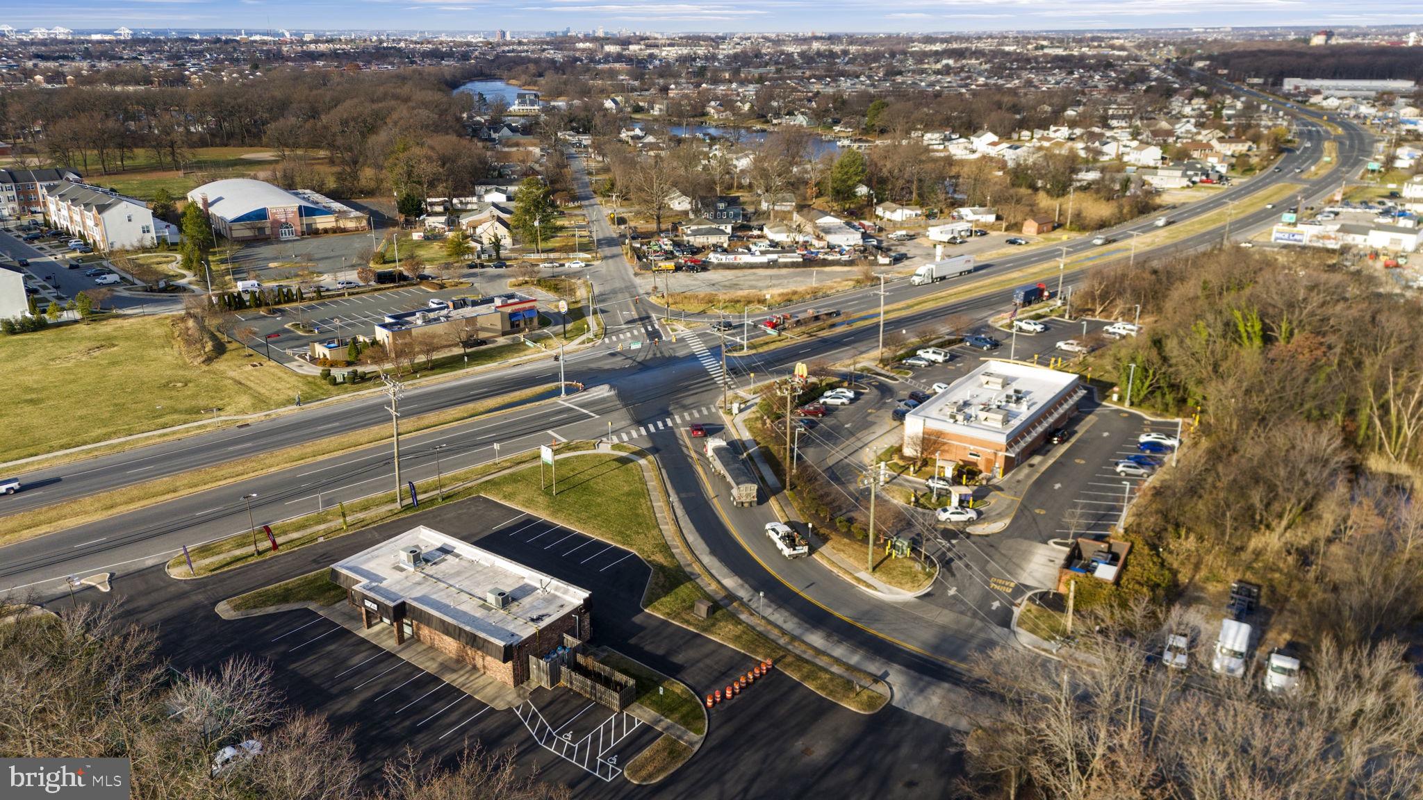 7715 Old Battle Grove Road Dundalk, MD 21222 - Photo 54 of 61 an aerial view of residential houses with outdoor space