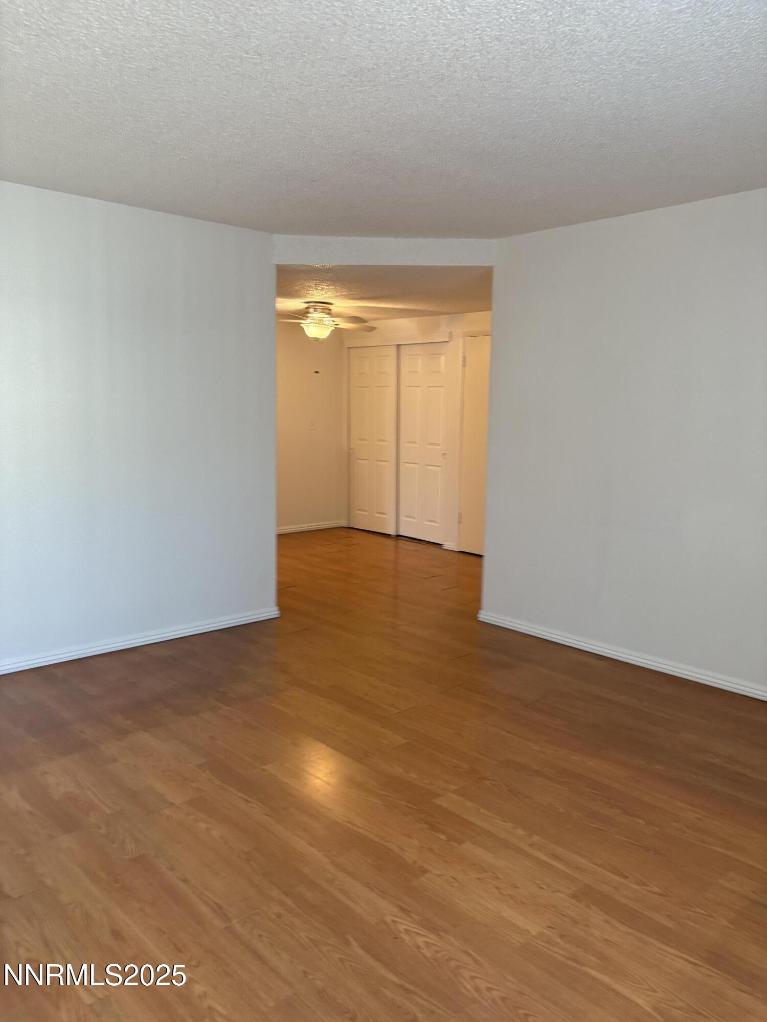 1347 Butler Street Reno, NV 89512 - Photo 2 of 30 a view of an empty room and window