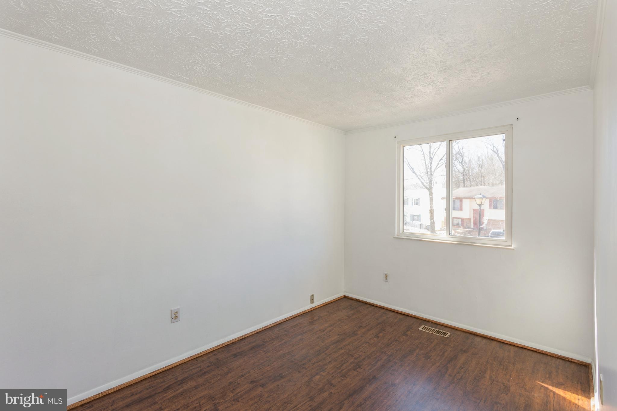 8471 Rippled Creek Court Springfield, VA 22153 - Photo 16 of 31 Bedroom 2 fresh ly painted Laminate flooring