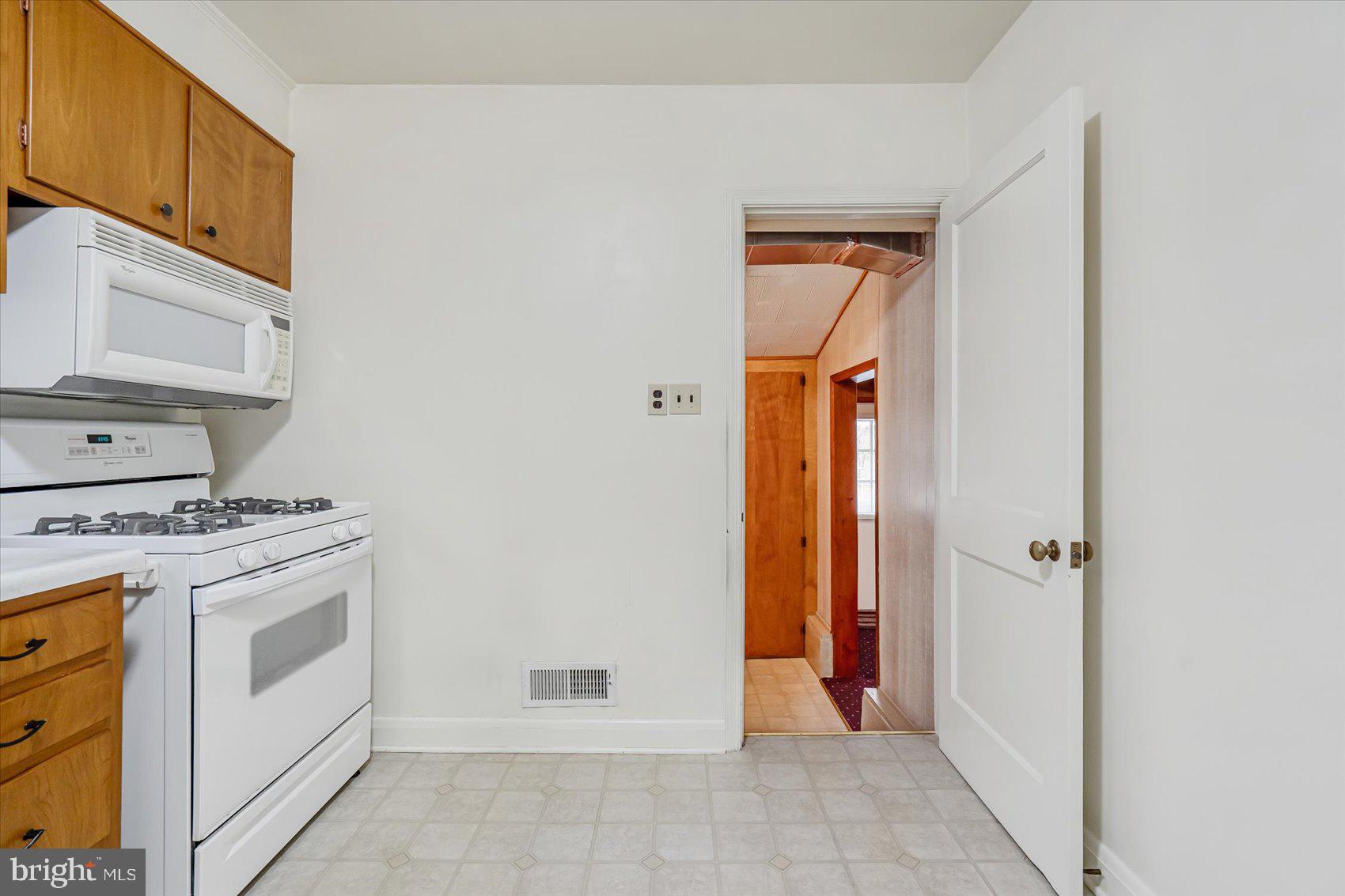 1528 Leslie Road Baltimore, MD 21222 - Photo 11 of 33 a view of a kitchen from the hallway