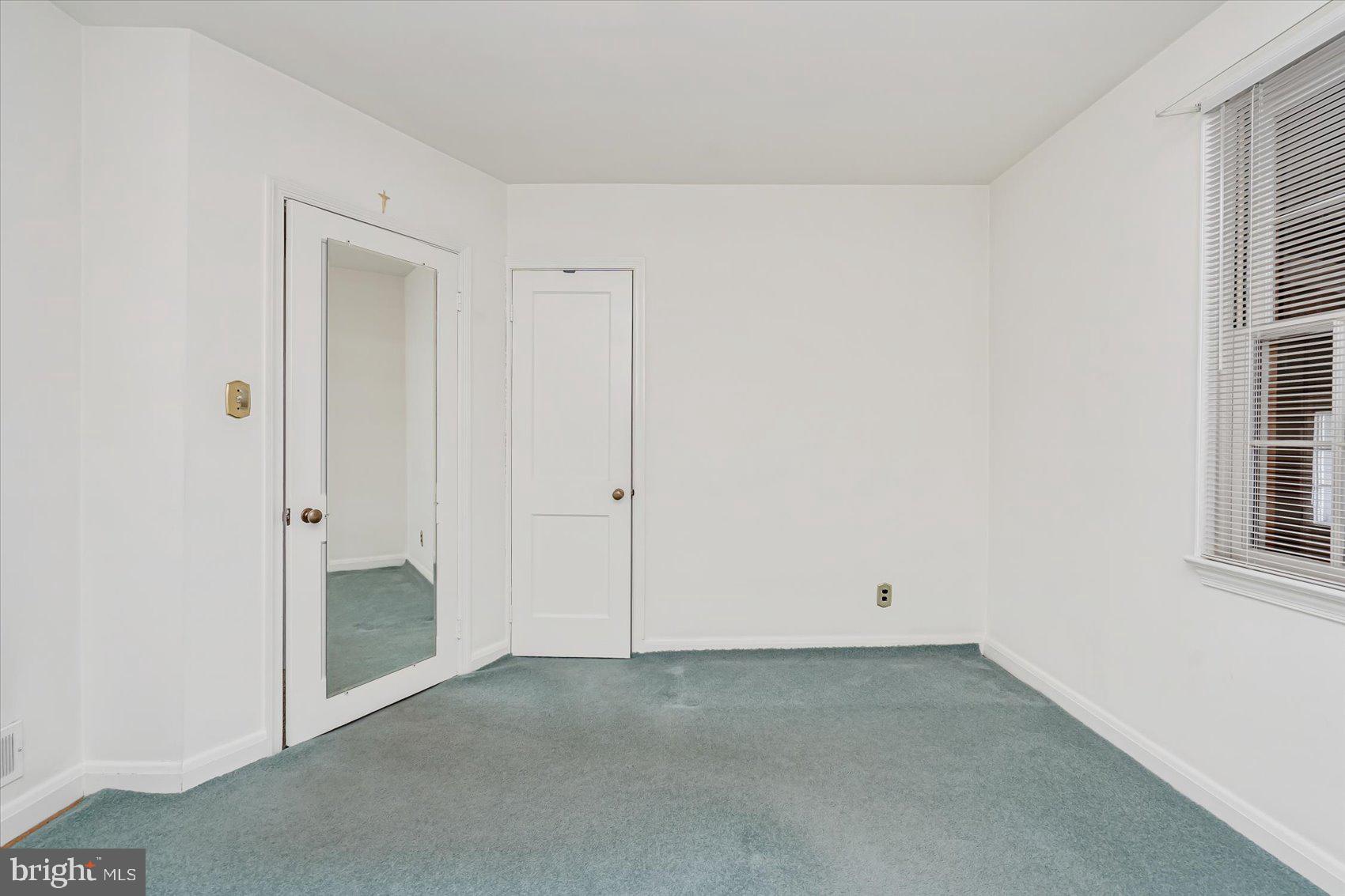 1528 Leslie Road Baltimore, MD 21222 - Photo 18 of 33 an empty room with windows