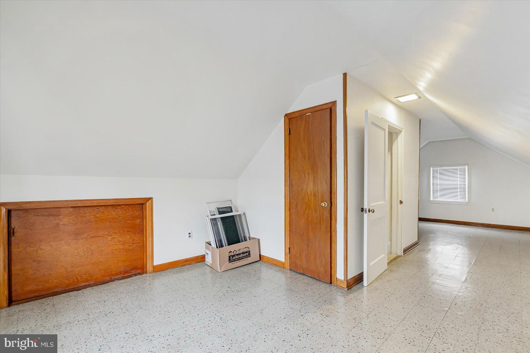 1528 Leslie Road Baltimore, MD 21222 - Photo 26 of 33 a view of room with workspace and windows