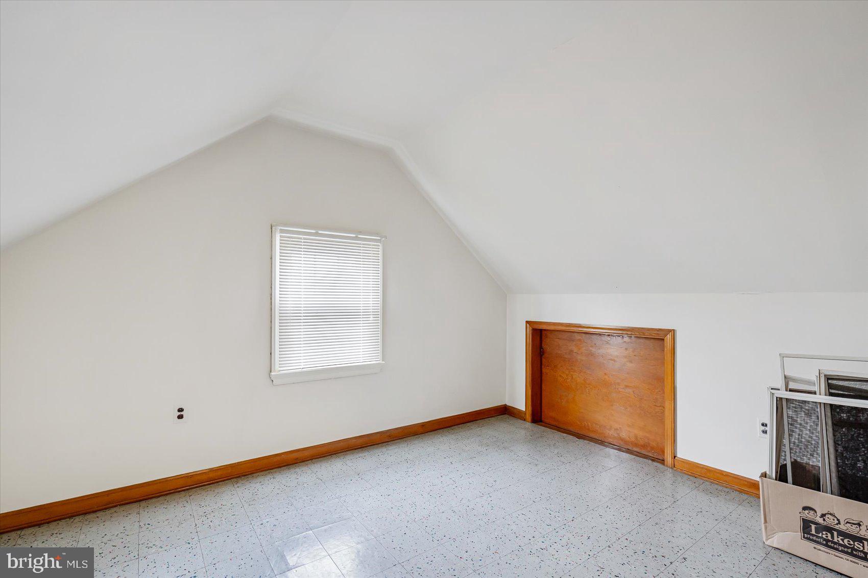 1528 Leslie Road Baltimore, MD 21222 - Photo 27 of 33 a view of an empty room with a window