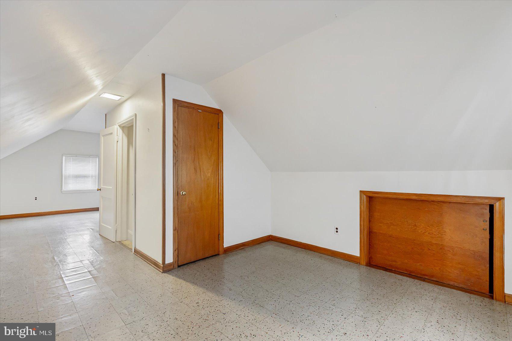 1528 Leslie Road Baltimore, MD 21222 - Photo 28 of 33 an empty room with a door