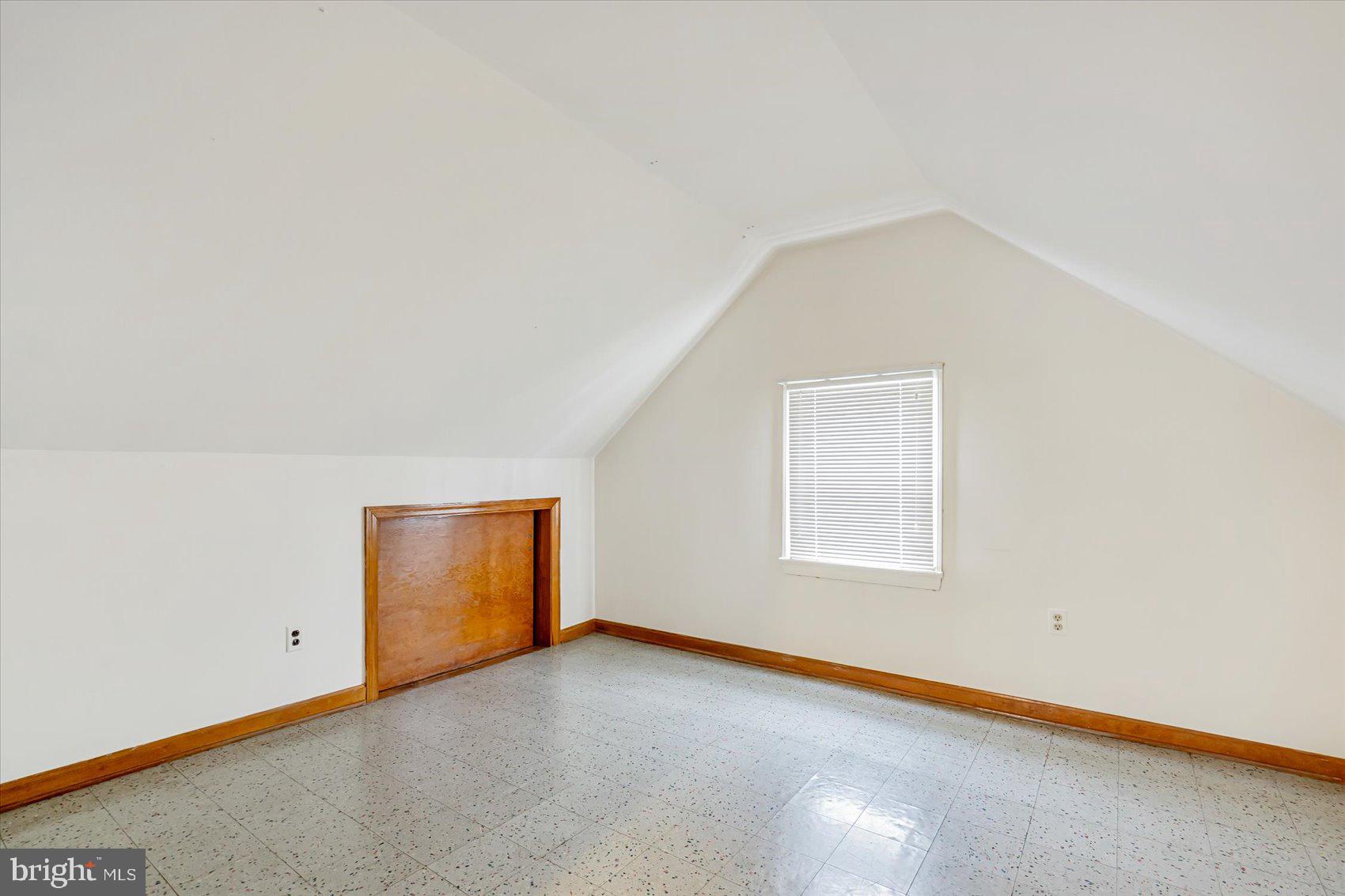 1528 Leslie Road Baltimore, MD 21222 - Photo 29 of 33 a view of an empty room with a window