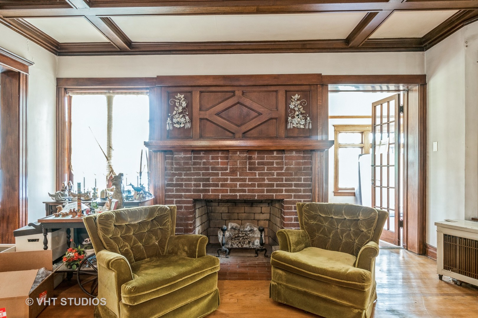 704 Sheridan Road Wilmette, IL 60091 - Photo 3 of 15 a living room with furniture a fireplace and a floor to ceiling window