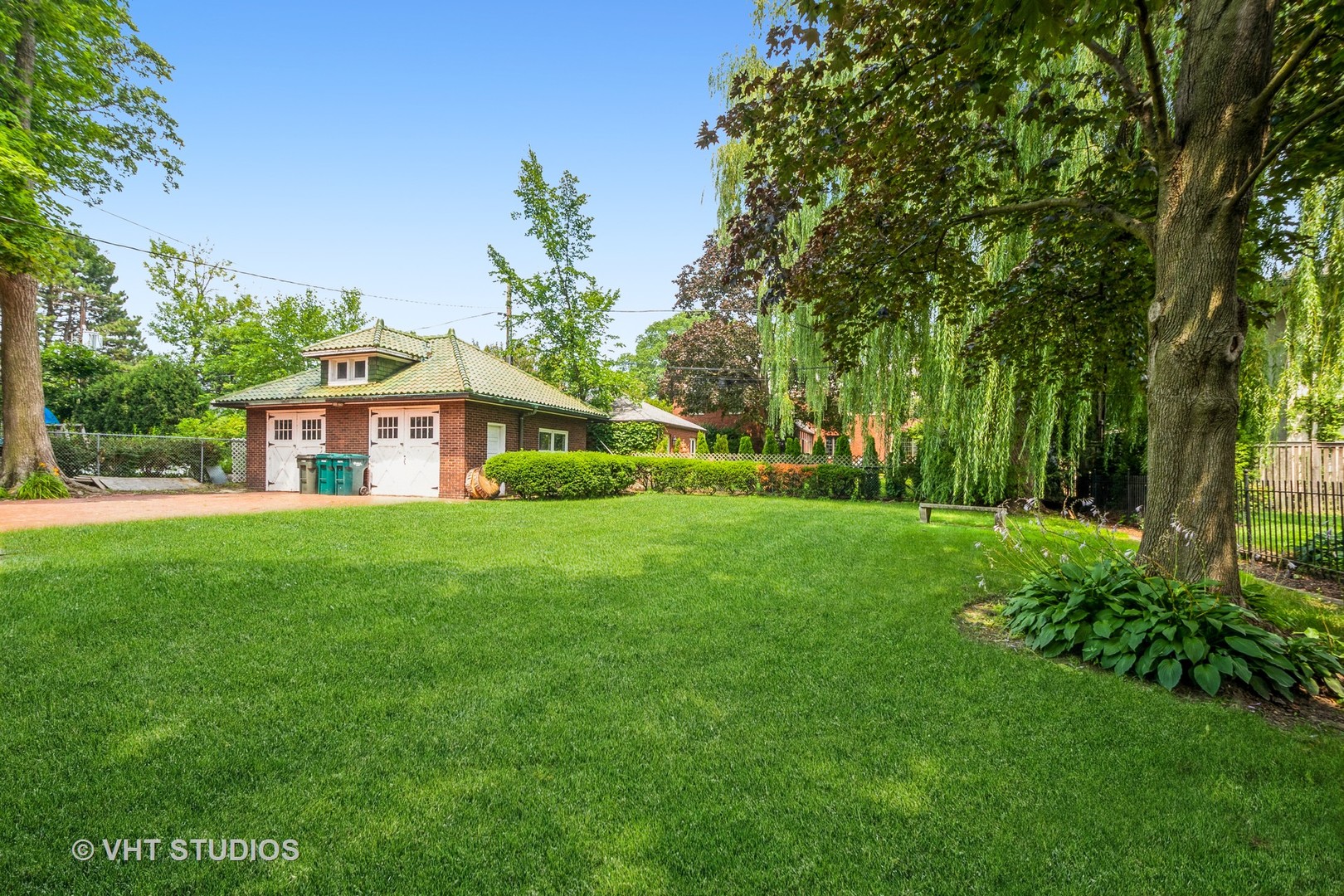 704 Sheridan Road Wilmette, IL 60091 - Photo 5 of 15 a front view of house with yard and green space